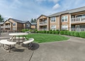 Thumbnail 11 of 55 - Orchard Park Apartments Outdoor Tables
