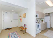 Thumbnail 16 of 38 - Kanekapolei Collection Kitchen Area and Entry way with decor