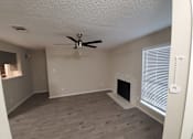 Thumbnail 4 of 24 - Trails of Walnut Creek living area with fireplace
