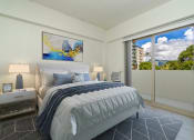 Thumbnail 3 of 38 - Kanekapolei Collection Bedroom with decor