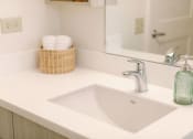 Thumbnail 25 of 38 - Kanekapolei Collection Bathroom Vanity and sink with decor