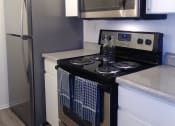 Thumbnail 3 of 22 - El Castillo Apartments kitchen area and alliances 