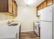 Thumbnail 2 of 35 - Parkside Villas kitchen area with appliances