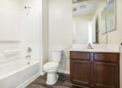 Thumbnail 30 of 35 - Parkside Villas bathroom vanity, toilet, and shower