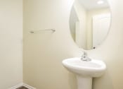 Thumbnail 34 of 35 - Parkside Villas bathroom sink and mirror