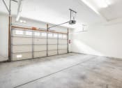 Thumbnail 35 of 35 - Parkside Villas interior view of spacious garage