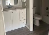 Thumbnail 8 of 9 - a bathroom with a sink toilet and shower