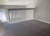 Thumbnail 7 of 9 - an empty room with gray carpet