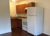 Thumbnail 10 of 20 - The Waterfront Apartments kitchen and refrigerator