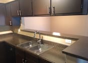 Thumbnail 13 of 24 - Trails of Walnut Creek kitchen sink, counters, and cabinets