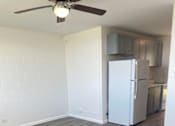 Thumbnail 7 of 20 - Aloha Kai Studio Kitchen and Living Area