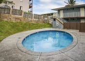 Thumbnail 4 of 17 - a backyard with a pool and patio with a house in the background