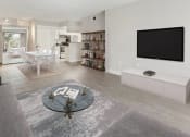 Thumbnail 10 of 17 - a living room with a table and a television