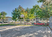 Thumbnail 12 of 32 - Courtside Apartments basketball court