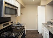 Thumbnail 16 of 20 - Bedford Oaks Apartments kitchen area