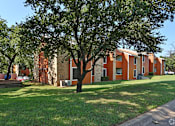 Thumbnail 3 of 20 - Bedford Oaks Apartments exterior building and yard