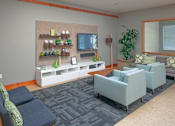 Thumbnail 9 of 25 - A living room with a grey sofa and a wooden chair.