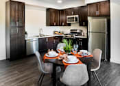 Thumbnail 18 of 28 - The Harrington dining table and kitchen area