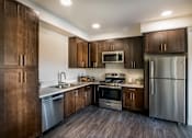 Thumbnail 19 of 28 - The Harrington kitchen with appliances