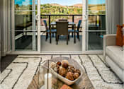 Thumbnail 21 of 28 - The Harrington furnished living room with balcony