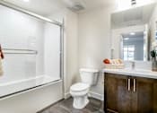 Thumbnail 24 of 28 - The Harrington bathroom vanity, toilet, and shower