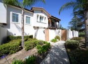 Thumbnail 7 of 35 - Parkside Villas exterior building pathway