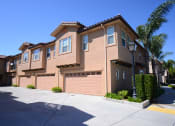 Thumbnail 16 of 35 - Parkside Villas exterior building garages