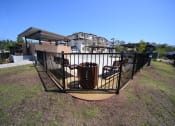 Thumbnail 25 of 27 - Yolo Apartments Exterior Lawn and Gate