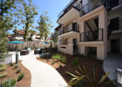 Thumbnail 23 of 27 - Yolo Apartments Pathway to Courtyard