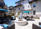 Thumbnail 5 of 27 - Yolo Apartments Fire Pit and Barbecue Area