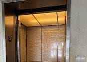 Thumbnail 7 of 24 - The elevator is currently on the second floor.