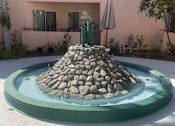 Thumbnail 10 of 16 - Hacienda Senior Villas courtyard fountain