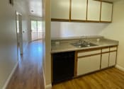 Thumbnail 3 of 16 - Hacienda Senior Villas One Bedroom kitchen area