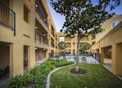 Thumbnail 4 of 11 - Heritage Place At Tustin walkway