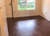 Thumbnail 9 of 20 - The Waterfront Apartments at Kahului living area and entry way