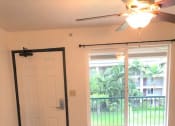 Thumbnail 8 of 20 - The Waterfront Apartments at Kahului living area and entry way
