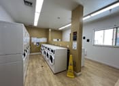 Thumbnail 14 of 18 - Irvine Inn Laundry Room