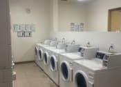 Thumbnail 15 of 17 - Irvine Inn laundry room