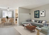 Thumbnail 1 of 6 - a living room with a couch and a table
