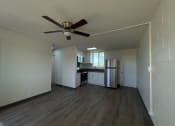 Thumbnail 4 of 27 - Leonui Stree Apartments Living room and kitchen