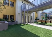 Thumbnail 3 of 11 - MacArthur Apartments courtyard
