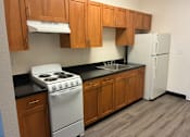 Thumbnail 6 of 18 - Miley Gardens Kitchen with Appliances
