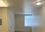 Thumbnail 11 of 18 - Miley Gardens Living Area
