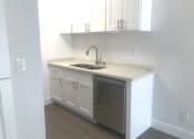 Thumbnail 12 of 12 - Millennium Apartments studio kitchen 2