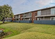 Thumbnail 4 of 15 - Oak Tree Village Apartments Exterior of Apartments