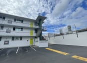 Thumbnail 13 of 27 - the building where the motel is located has a parking lot