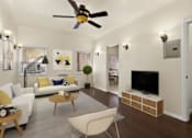 Thumbnail 2 of 13 - A living room with a white couch, a coffee table, and a ceiling fan.