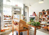 Thumbnail 22 of 25 - A store with a variety of products on display.