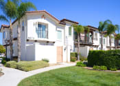 Thumbnail 6 of 35 - Parkside Villas exterior building and lawn