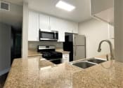 Thumbnail 3 of 18 - Peachgrove Apartments Kitchen